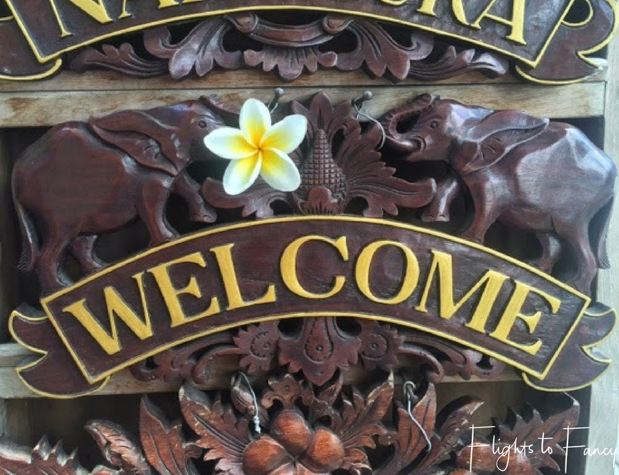 Flights To Fancy Wooden signs at the markets in Bali