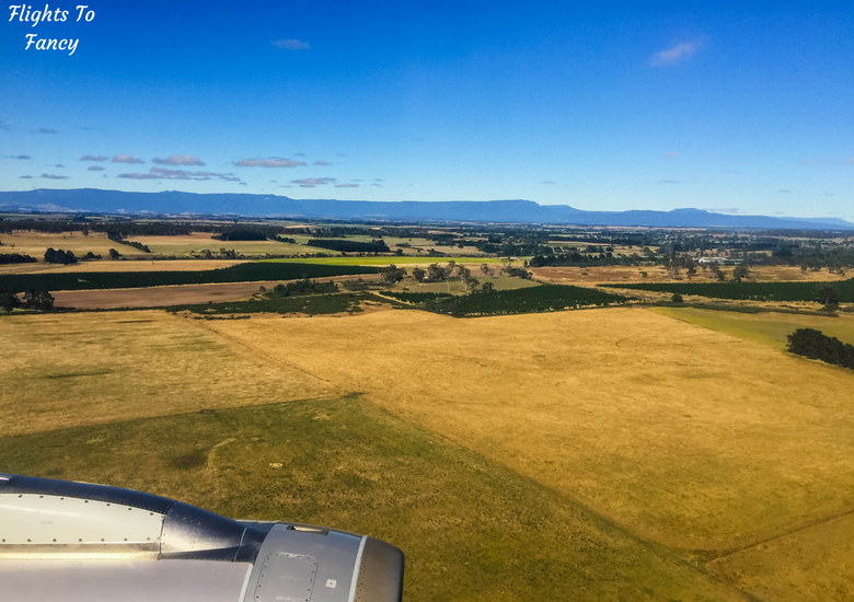 Flights To Fancy: Jetstar A320 Economy Class Review JQ745 SYD-LST - Plane Window Landing Launceston Tasmania