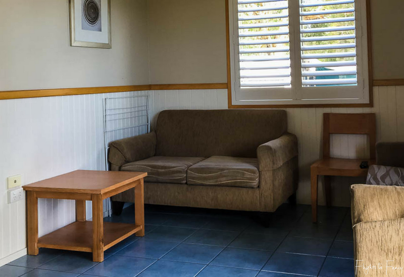 Lounge room in waterfront cabin at Great Lakes Caravan Park Forster
