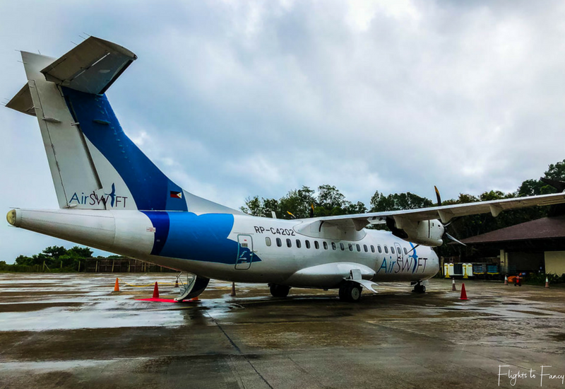  AirSWIFT Airlines flight T6337 on the ground at El Nido Airport