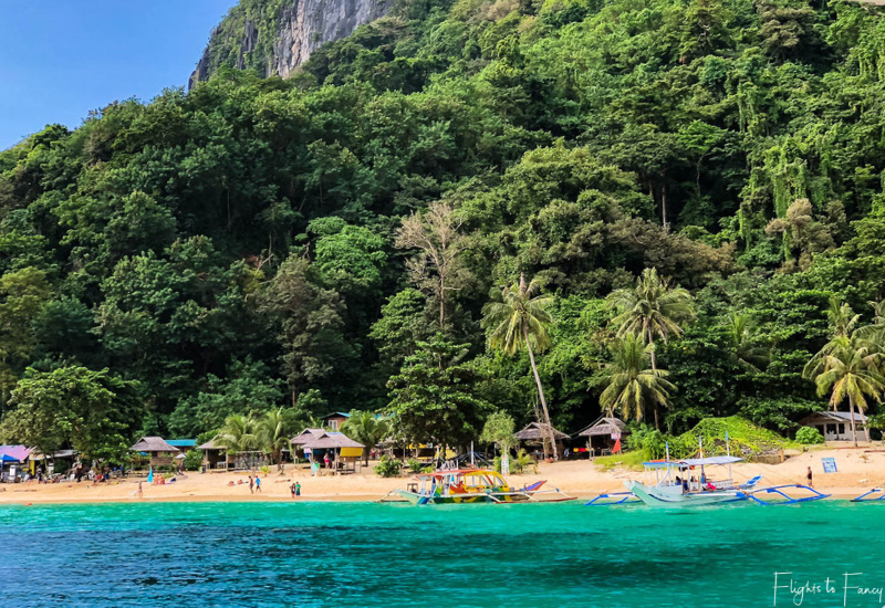 El Nido Tour A - Bangkas anchored on Seven Commandos Beach El Nido