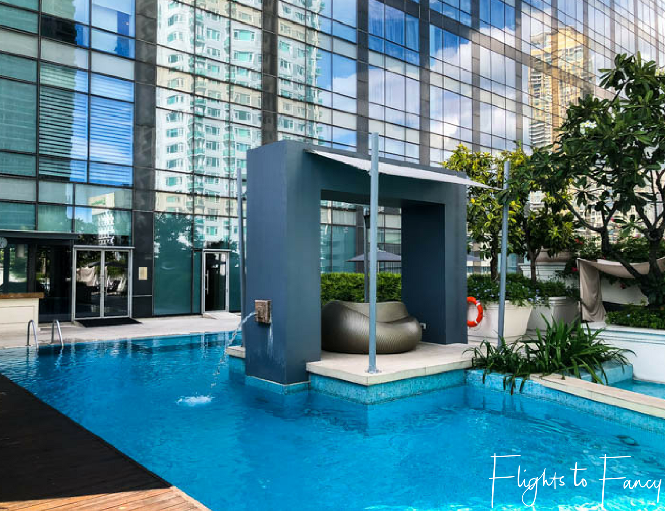 Flights To Fancy @ Raffles Makati - Fabulous pools always feature in 5 star hotels in Manila