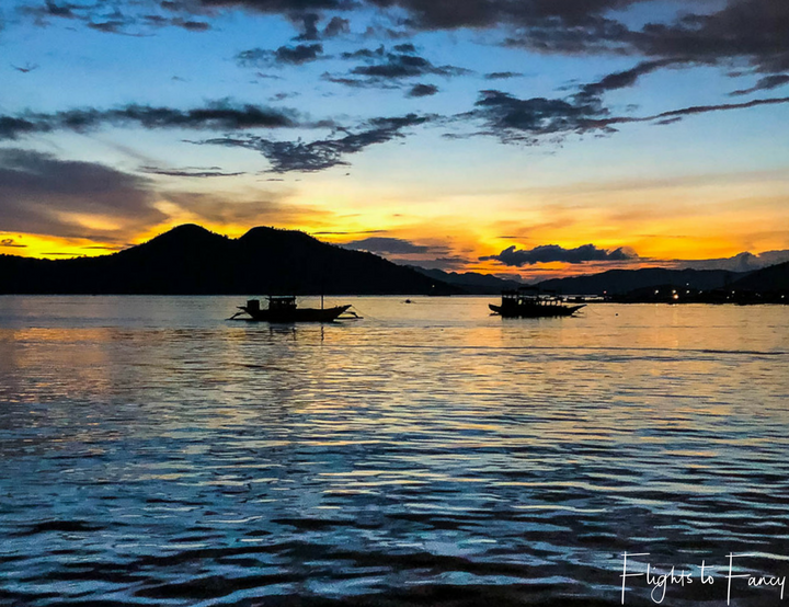 Where to stay in Coron: Sunset over the water at Sunlight Guest Hotel Coron Palawan