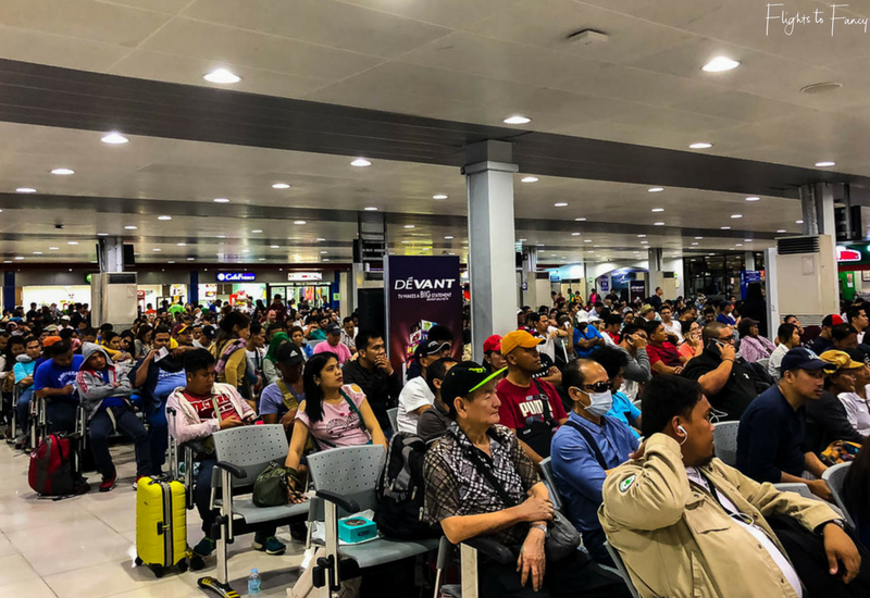 Packed waiting room at Manila NAIA terminal 4