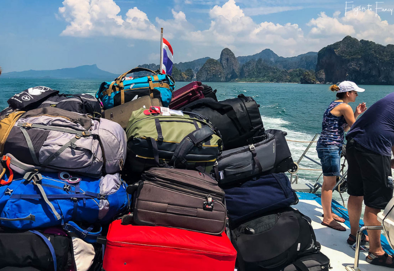 Luggage piled on the top deck of our Koh Lanta ferry
